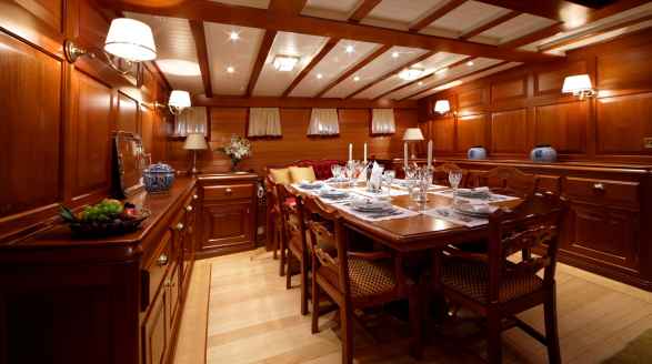 55m sailing yacht Elena for charter - main saloon dining