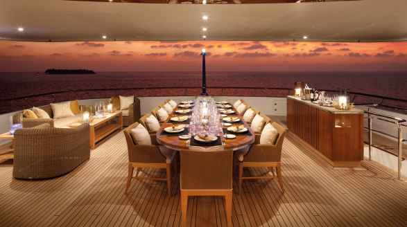 63m motor yacht Lady Britt for charter - dining on deck
