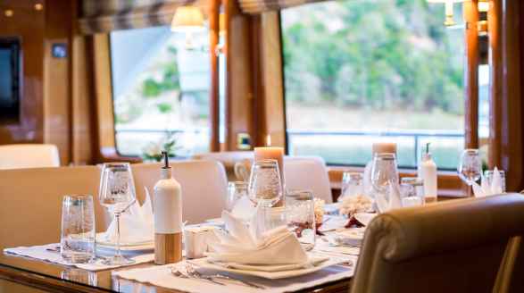 Rebecca V, 25.8m charter yacht - main saloon dining table