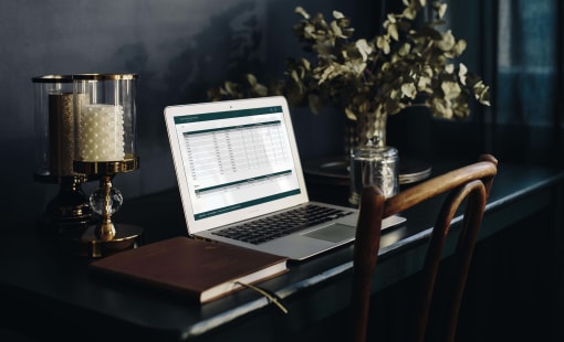 Laptop showing accounting software Voly on a desk