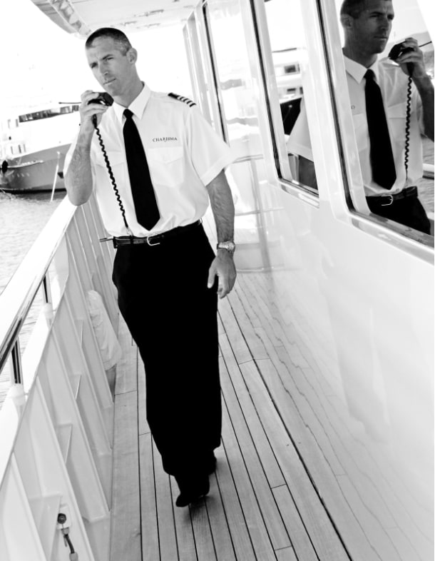 Superyacht captain using the radio