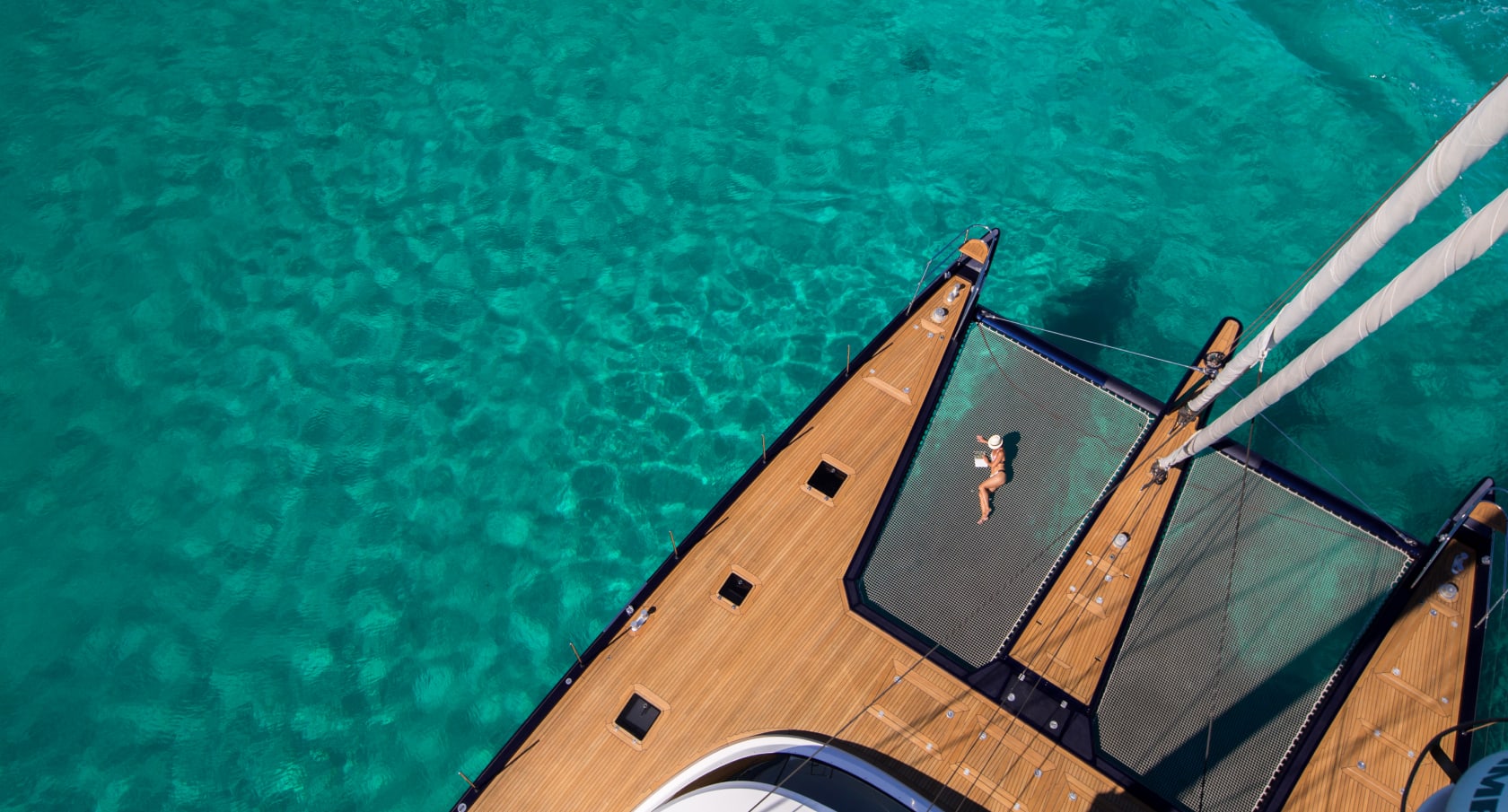 Discover the finest luxury yachts - Catamaran in turquoise waters