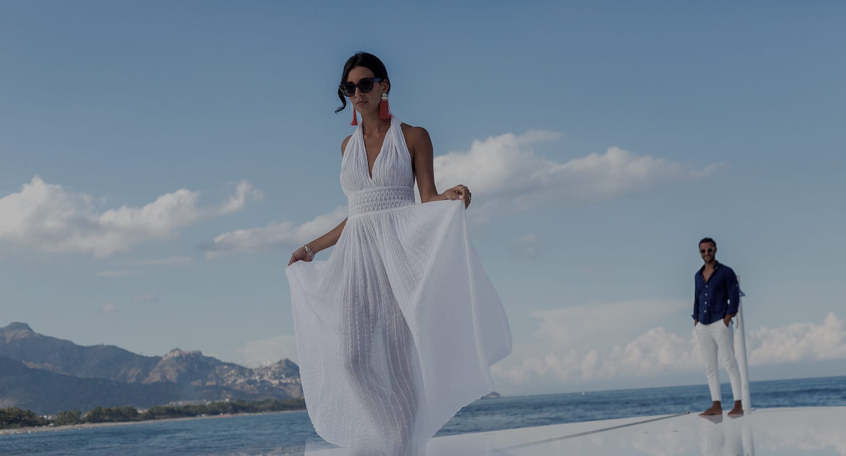 Client Experience - Glamorous couple enjoy a yacht charter