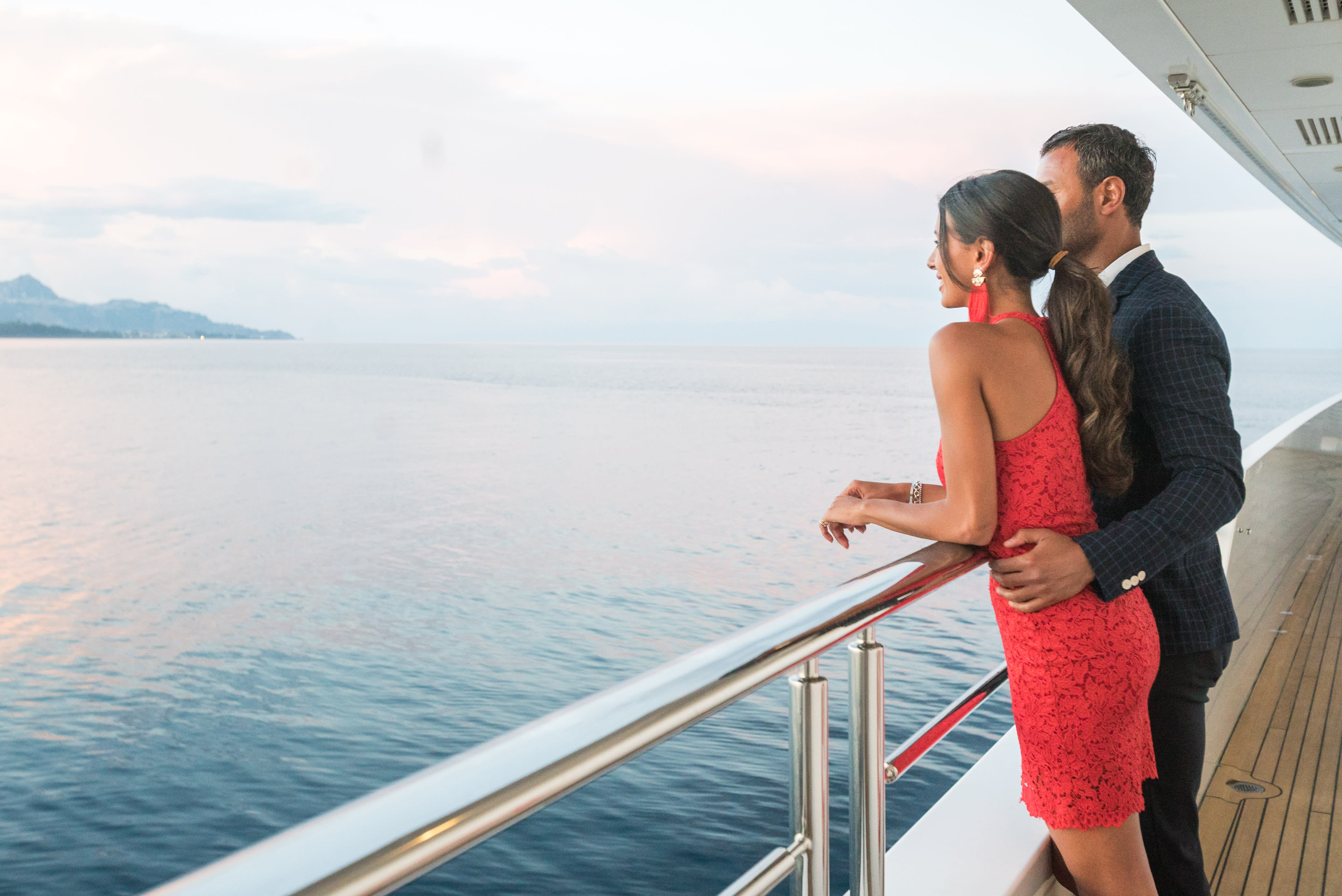 Couple looking into the distant sea