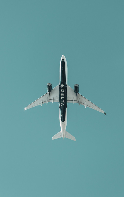 Travel agent helping a client book luxury airline tickets