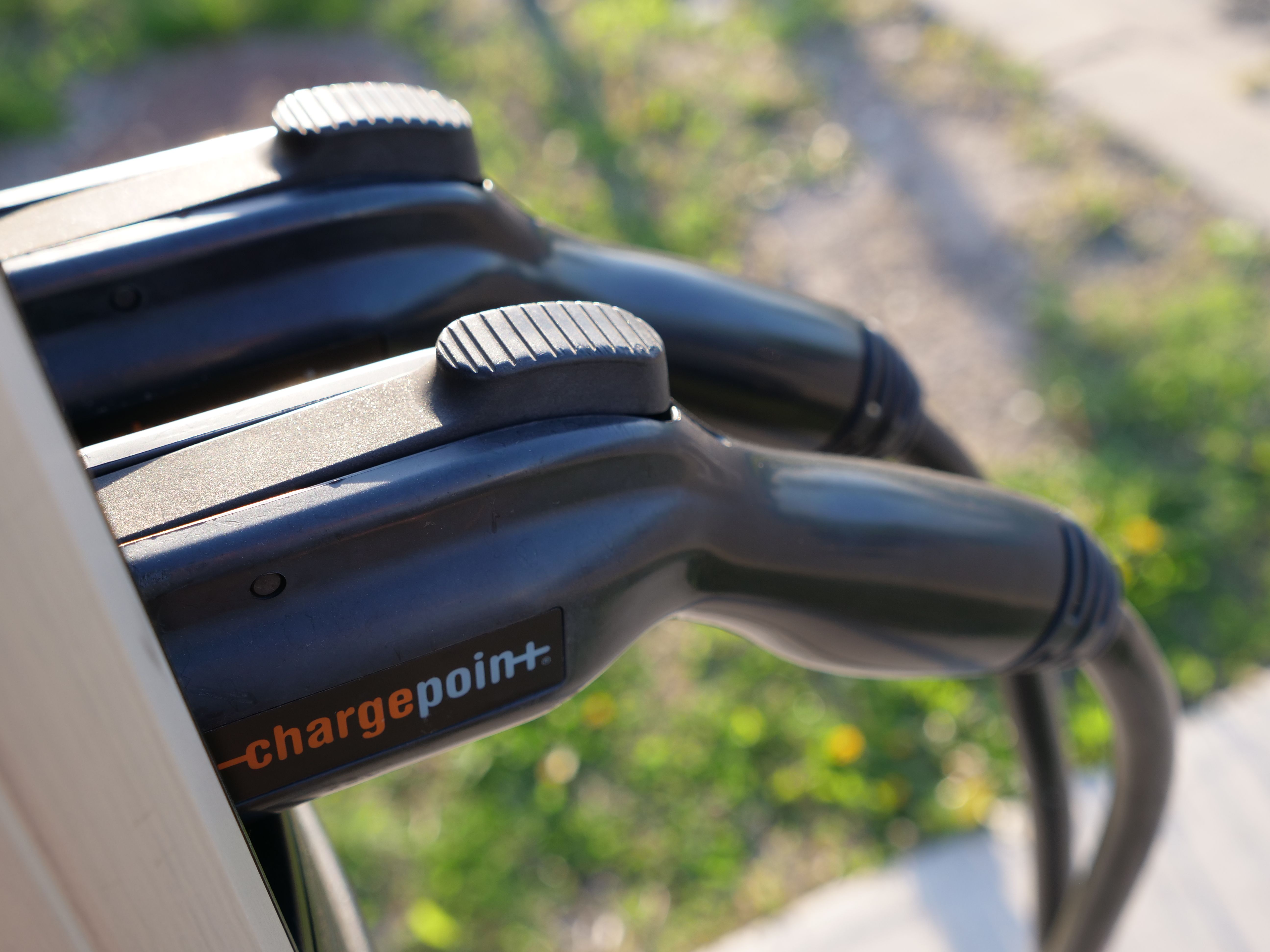 Electric vehicle charging station at MSP airport parking ramp