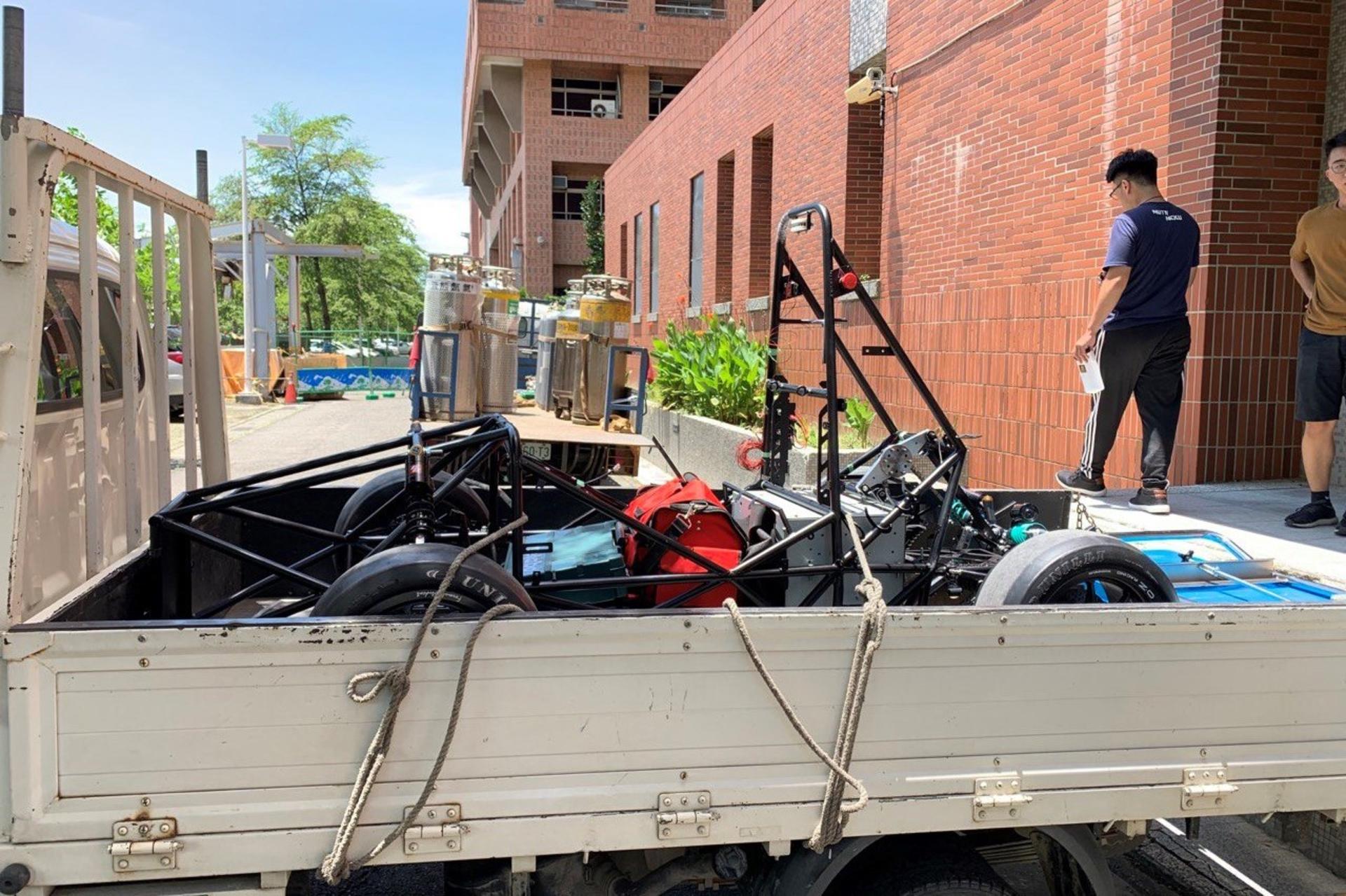 Packaging the vehicle to be transported to testing site.