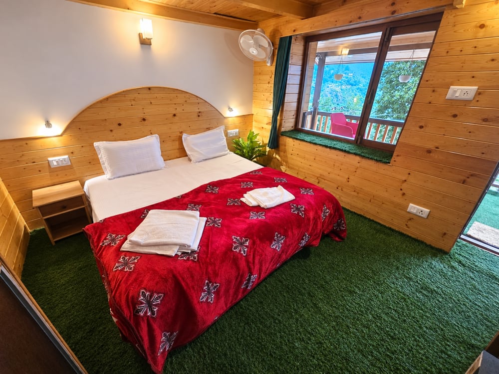 Pine & Pour Interlinked Family Suite Bedroom 1 with balcony view