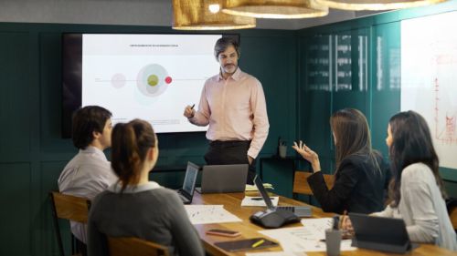 Business Executives Discussing During Meeting