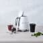 Smeg Retro Kettle, 1.7L - Matt White lifestyle lid open