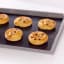 NoStik Reusable Baking Liner, on tray with pastries