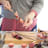 KitchenCraft Flat Sided Skewers, Set of 6 at a prepping station with figs and plums  