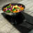 Snappy Chef 3000W Double Induction Cooker Plate, with a pan and veggies