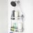 Umbra Flex Shower Caddy - White on the shower head