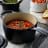 Le Creuset Signature Cast Iron Saucepan with Lid, 18cm with food