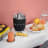 Smeg Retro Citrus Juicer - Matt Black with waffles, muffins and juice