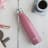 Built Double Walled Stainless Steel Water Bottle, 480ml - Powder Pink on the desk