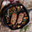 Victoria Matte Black Enamelled Cast Iron Grill Pan with Helper Handle, 26cm in use