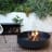 Sprung Outdoor Living Round Fire Pit with fire 