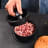 Creative Cooking 3-In-1 Burger Press on the kitchen counter with meat