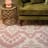 India Ink Ancient Ikat Rug - Mauve  on the floor