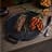 Victoria Enamelled Round Reversible Cast Iron Griddle, 32cm on the table with food