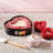 Le Creuset Non-Stick Heart Springform Cake Tin on the kitchen counter with other Le Creuset products