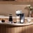 Nespresso Vertuo Lattissima Coffee Machine - White on the kitchen counter with coffee