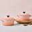 Le Creuset Peche Mini Stoneware Cocotte, 10cm on the table