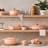 Le Creuset Peche Mini Stoneware Cocotte, 10cm on the shelf