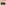 Le Creuset Non-Stick Mini Muffin Pan, 6-Cup angle on the kitchen counter