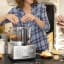 Magimix Compact 1100W Food Processor, 5200XL - Satin on the table