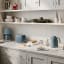 Smeg Retro 2-Slice Toaster, 950W - Storm Blue Matt on the kitchen counter