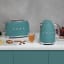 Smeg Retro Cordless Kettle, 1.7L - Matte Emerald Green on the kitchen counter 