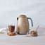 Smeg Retro Kettle, 1.7L - Matt Champagne lifestyle front view