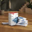 Miele GN Vacuum Cleaner Bags, Pack of 4 on the table