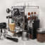 Krups Burr Coffee Grinder next to Rocket Espresso Machine