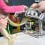 Imperia Italian SP150 Double Cutter Pasta Machine, pasta sheet being cut