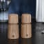 Crushgrind Stockholm Oak Grinders, Set of 2 on the table