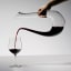 Riedel Amadeo Decanter, 750ml pouring red wine in a wine glass