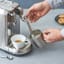 Action image of Nespresso Creatista Plus Automatic Stainless Steel Espresso Machine with Automatic Steam Wand