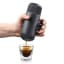 Picture of the Wacaco Nanopresso Portable Coffee Maker in the Grey colour way being used