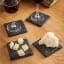 Boska Slate Coasters, Set of 4 on the table with wine glasses and cheese 