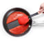 Dreamfarm Supoon Spoon - Red with a pan and tomato soup