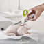 Joseph Joseph PowerGrip Kitchen Scissors cutting chicken 