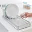 Brabantia Compact Dish Drying Rack light grey with plates and glasses