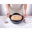 NoStik Reusable Cake Tin Liner, Round, lifting cake from tin