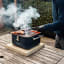 Everdure by Heston Blumenthal Cube Charcoal Portable Braai with meat