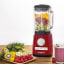 Magimix Power Jug Blender, 1.8L - Red on the table