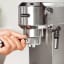 Action image of DeLonghi Dedica Pump Manual Espresso Coffee Machine, EC685